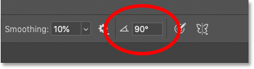 Change the brush angle in the options bar in Photoshop