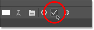 Clicking the check mark to accept the text in Photoshop