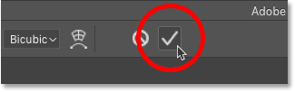 Clicking the checkmark to close Free Transform in Photoshop