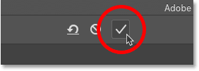 Clicking the check mark to crop the image in Photoshop