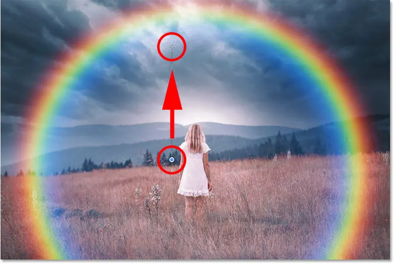 Zeichnen Sie einen Schwarz-Weiß-Verlauf auf die Ebenenmaske, um den unteren Teil des Regenbogens in Photoshop auszublenden