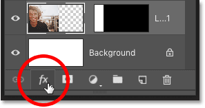 Select the first image layer above the background layer in the Layers panel of Photoshop