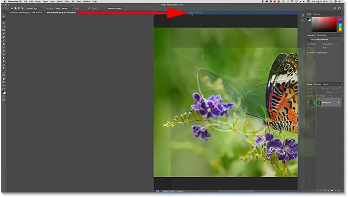 Move a tab between document windows in Photoshop.