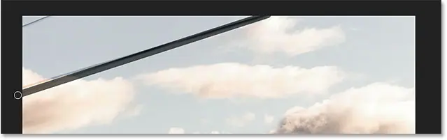 Remove the second wire using the Spot Healing Brush Tool.