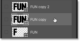 Выберите второй слой формы на панели «Слои» в Photoshop.