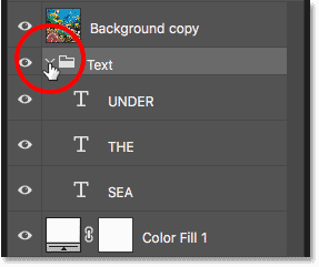 Las capas de texto ahora están dentro de un grupo de capas en Photoshop