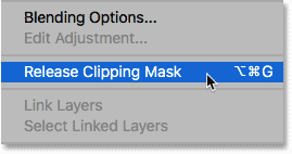 اختيار أمر Release Clipping Mask من قائمة لوحة Layers
