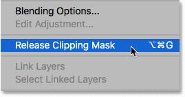 Elija el comando Liberar máscara de recorte en el menú del panel Capas