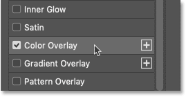 Add a Color Overlay effect in the Layer Style dialog box in Photoshop