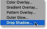 Choosing Drop Shadow from the Layer Effects menu in Photoshop