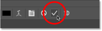 Clicking the check mark to accept the text in the Photoshop options bar