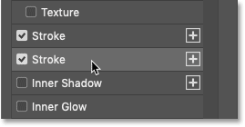 Select the first stroke in the Layer Style dialog box in Photoshop