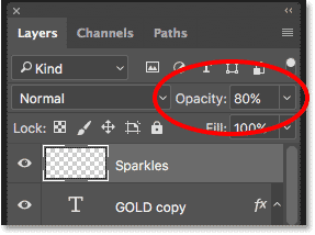 Decrease the Sparkles layer's opacity