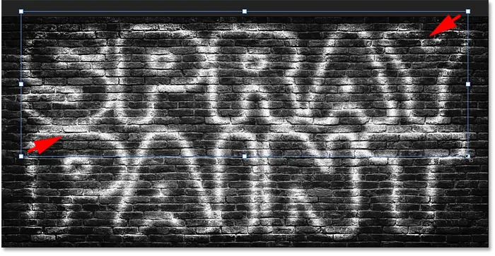 Resize the copy of the splattered text effect in Photoshop