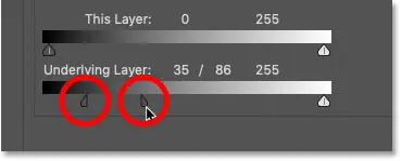 Drag the black Blend If slider in half in Photoshop