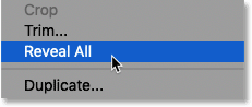 Choosing the Reveal All command in Photoshop
