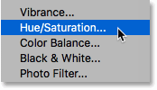 Add a Hue/Saturation adjustment layer to the fire text effect