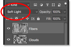 Blend the texture of the fibers into the flame by changing the blending mode to Soft Light