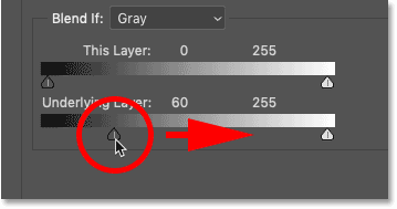 Faites glisser le curseur du calque inférieur noir dans les options de fusion de Photoshop