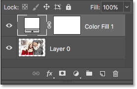 The Layers panel displays the fill layer on top of the image.