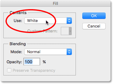 Измените параметр «Использовать» на «Белый» в диалоговом окне «Заливка» в Photoshop. Изображение © 2016 Photoshop Essentials.com